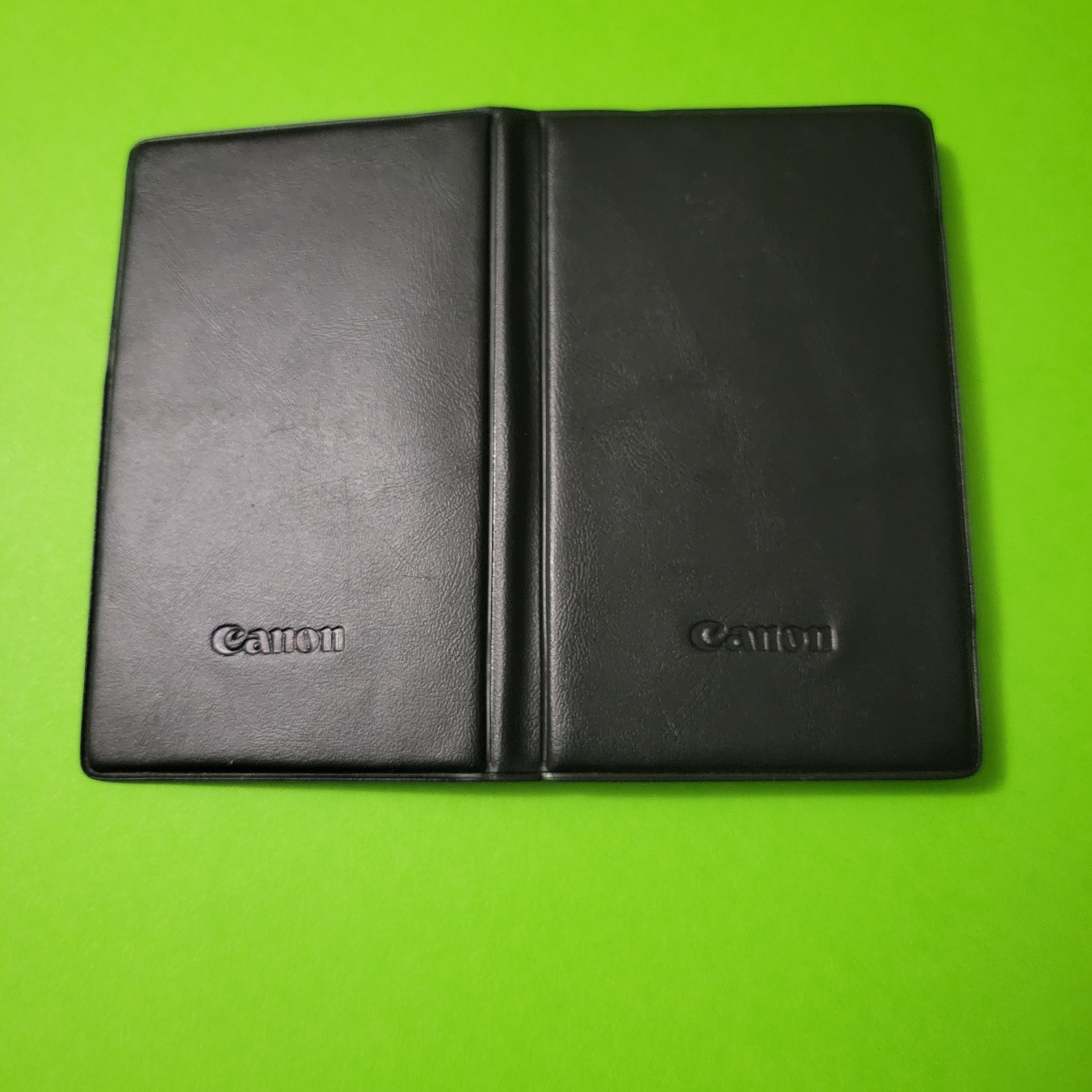 An image of the case of a Canon FC-42S four function plus calculator